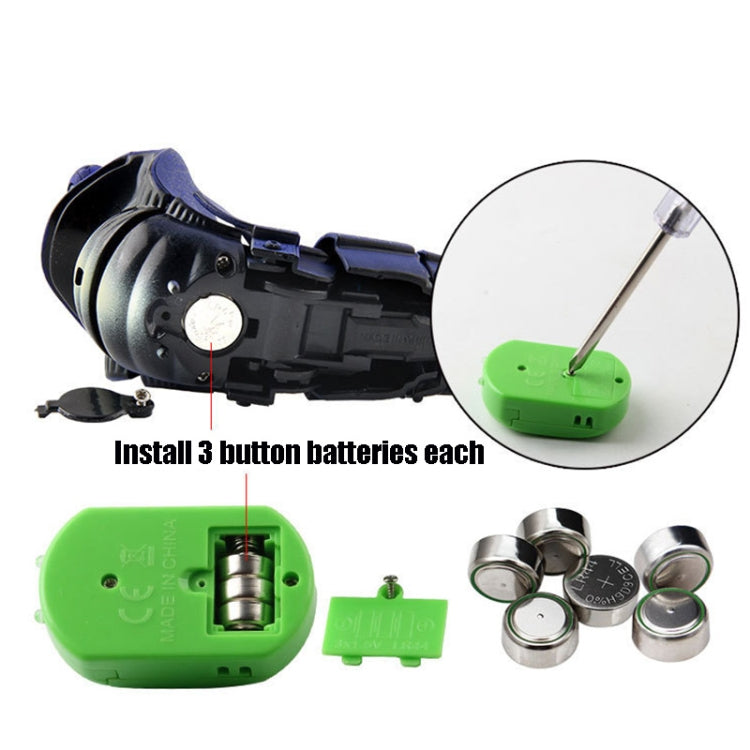 Purple cobra toy with open battery compartment and green infrared remote, plus spare batteries.