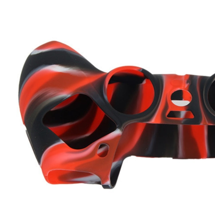 Silicone game controller handle cover, red and black camouflage, grip close-up