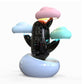 Child wake-up alarm clock with cloud weather light, glowing clouds, digital display on light blue base