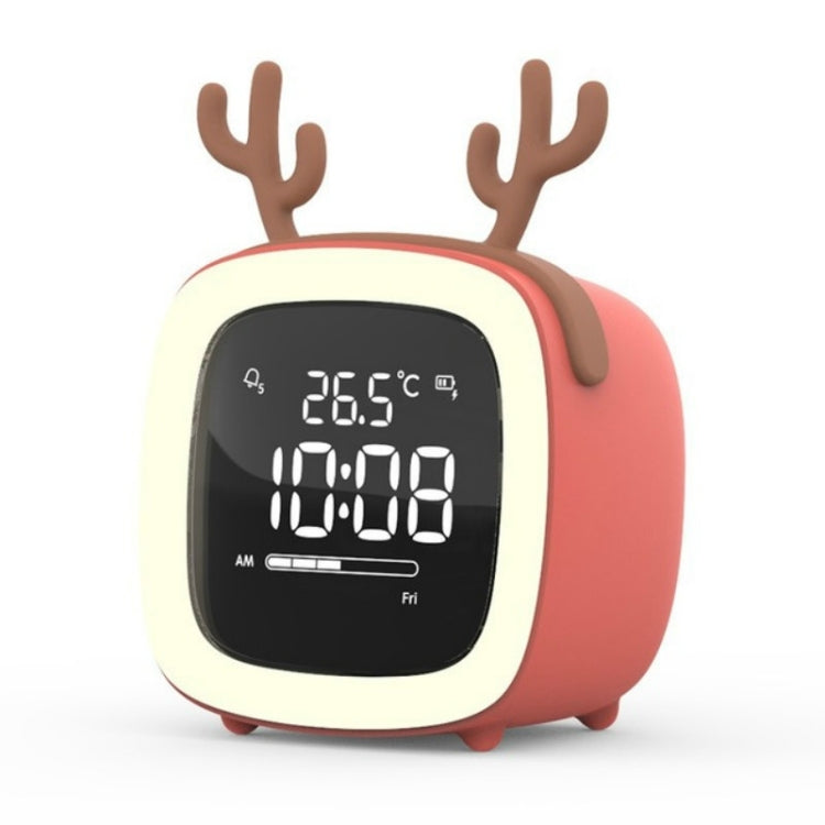 Children's deer-shaped LED alarm clock in coral red with glowing display and antlers