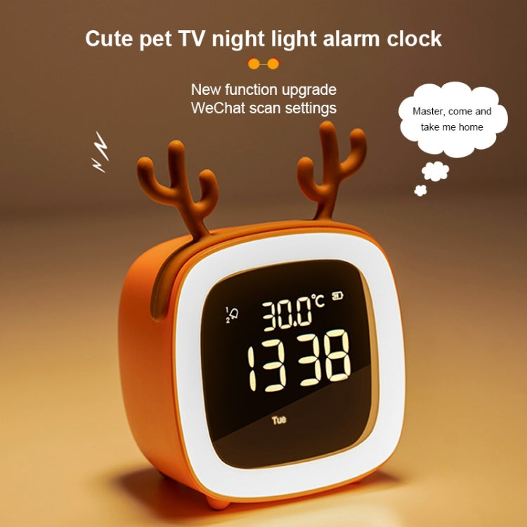 Orange deer-shaped kids LED alarm clock with glowing digital time display