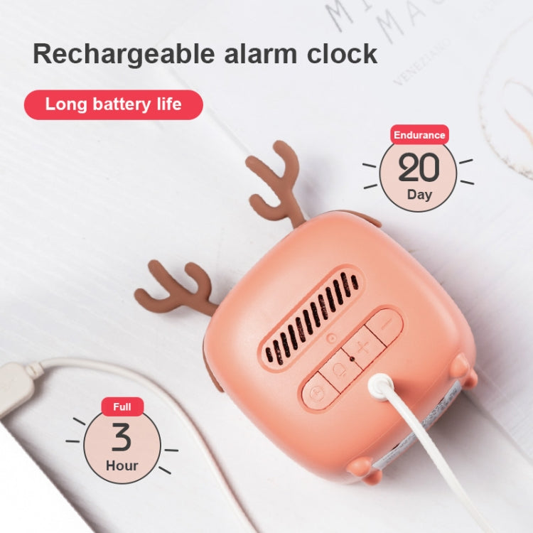 Coral red deer-shaped LED alarm clock charging with USB cable connected on back