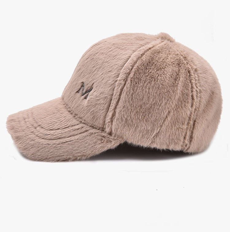 Beige plush baseball cap with curved brim and small M logo