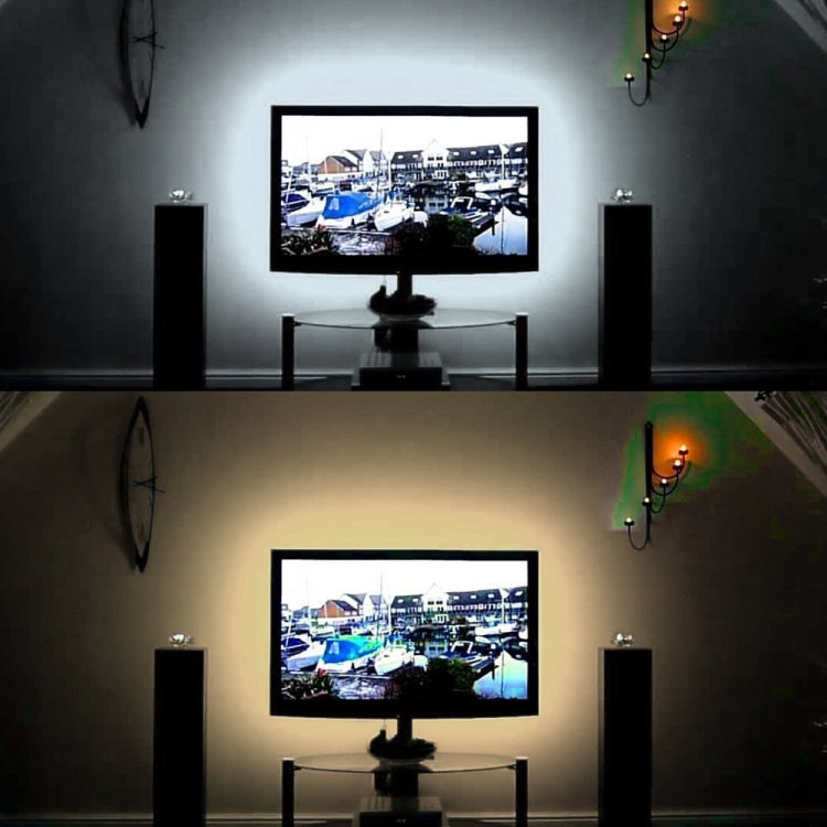 Warm and white USB LED strip lights glowing around a room wall
