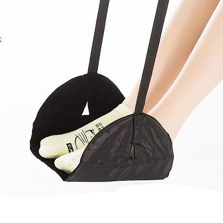 Black foot rest hammock with two straps, cradling a shoe and foot