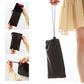 Black drawstring pouch with folded foot rest hammock for easy travel storage