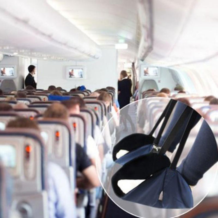 Black foot rest hammock clipped to an airplane seat for resting feet