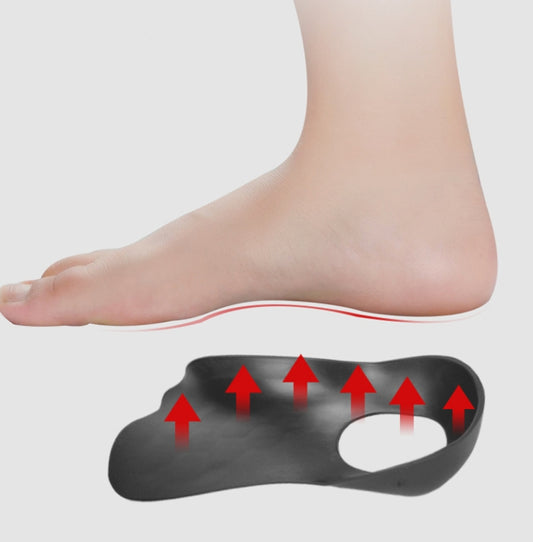 Black orthopedic insole under foot, arch support and heel cutout for valgus support