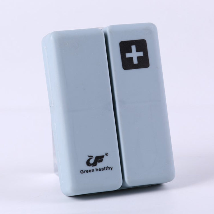 Blue folding pill box with plus symbol, compact two-panel sealed case