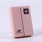 Pink folding pill box with plus symbol, compact two-panel sealed case