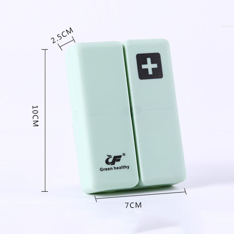 Mint green folding pill box with plus symbol, compact two-panel sealed case
