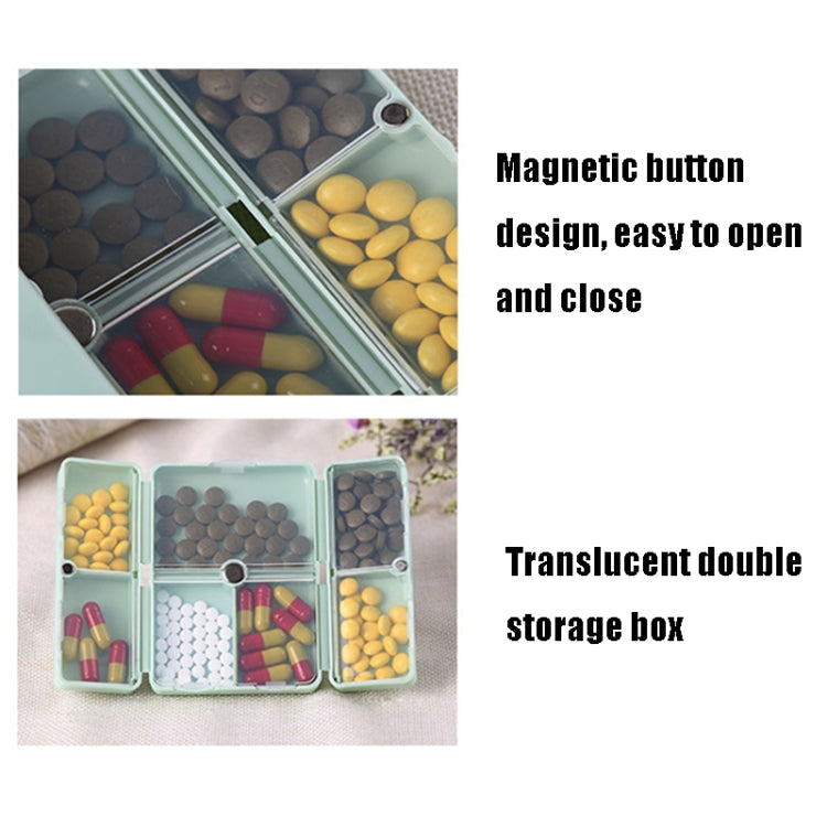 Translucent pill box with inner compartments and black plus control button