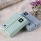 Folding sealed pill box with cross-mark compartments, mint and dark blue