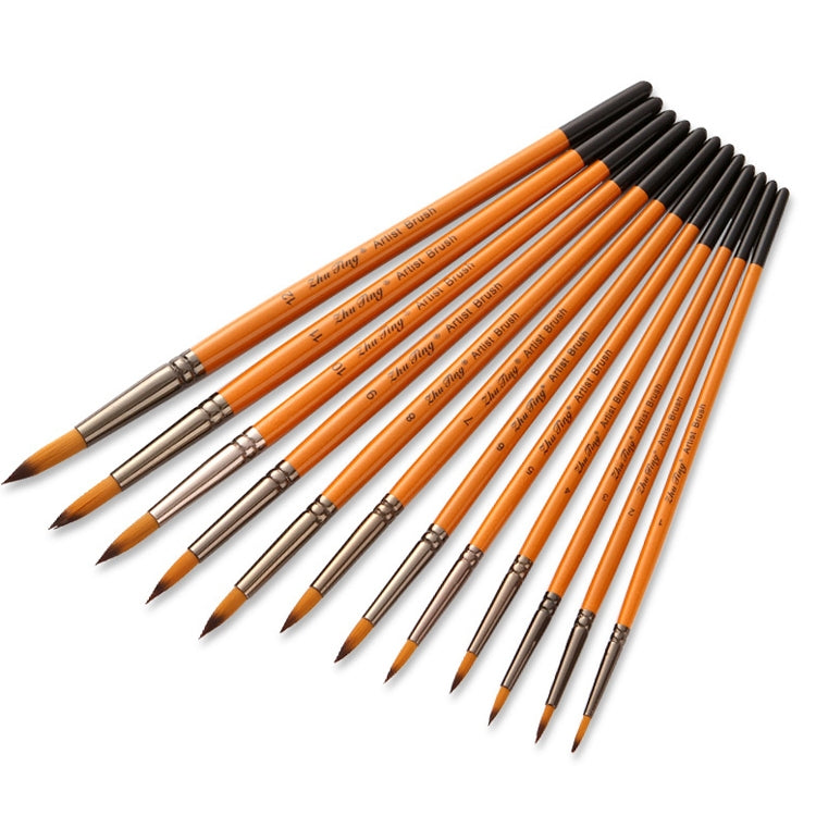 Twelve watercolor hook-and-line brushes fanned out, orange handles, pointed bristles