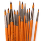 Close-up of watercolor hook-and-line brushes with orange handles and tapered bristle tips