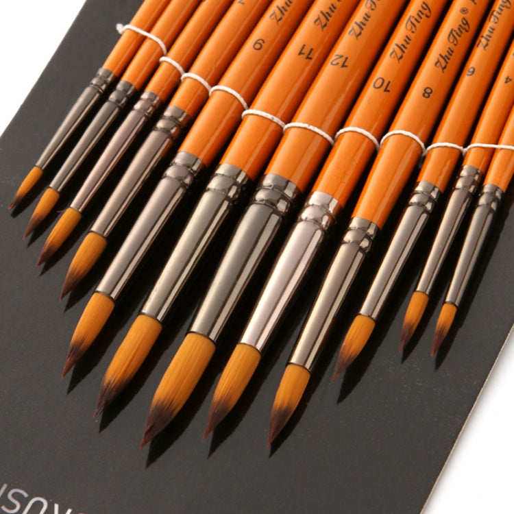 Watercolor hook-and-line brushes on display card, orange handles and pointed bristle ends