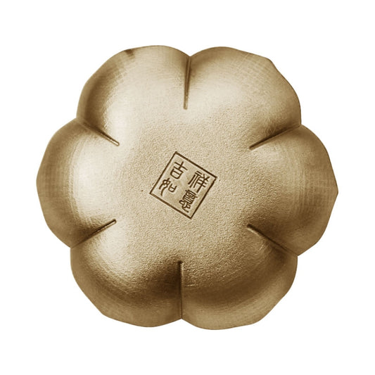 Flower-shaped gold incense burner base with central incense hole and stamped mark