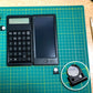 Portable LCD writing board with visible battery compartment area