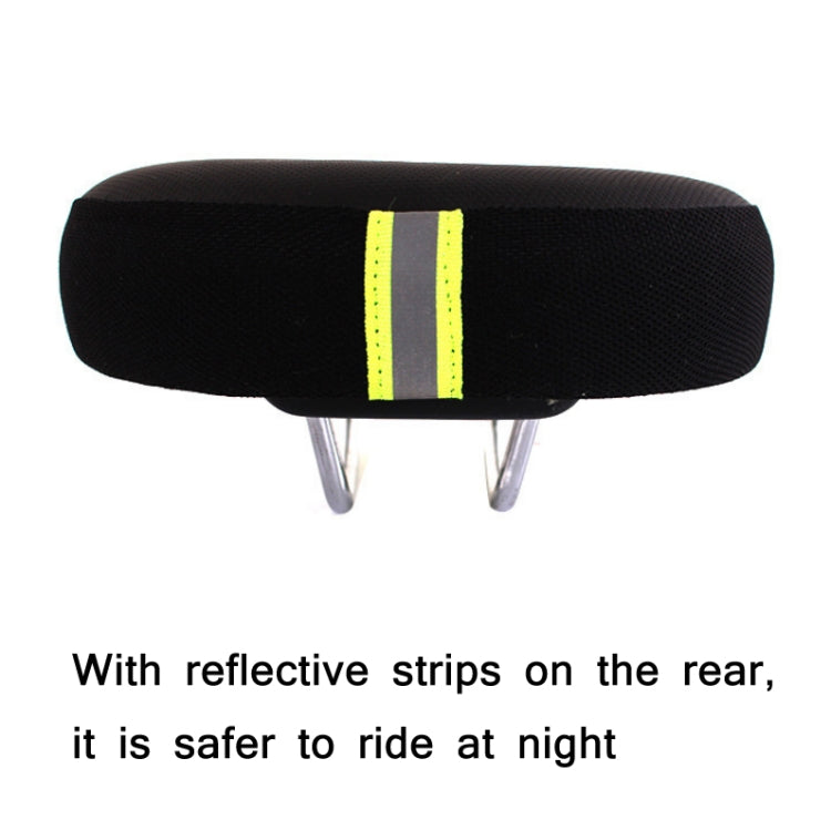Black bicycle saddle with reflective neon green rear stripe