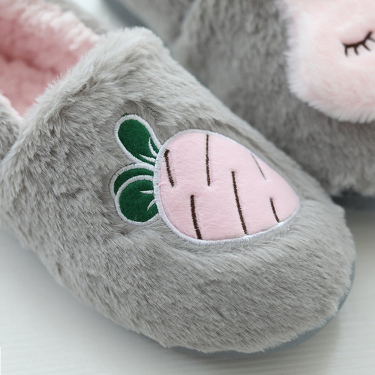 Gray cotton plush slipper close-up with pink fruit face applique and green leaf details