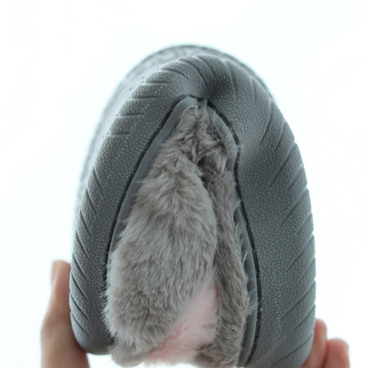 Gray cotton plush slipper side view with textured outer and soft faux-fur trim