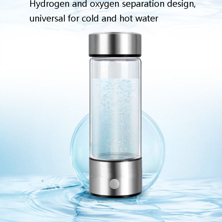 Portable water cup with clear body and stainless base, showing separation in blue-tinted water, 420 ml