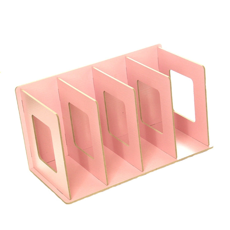 Pink wooden media rack with angled design and multiple open storage compartments
