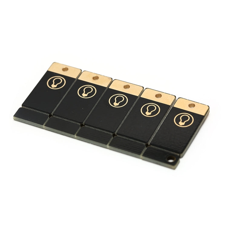 Pack of mini black USB LED keychain light boards with gold hanging holes