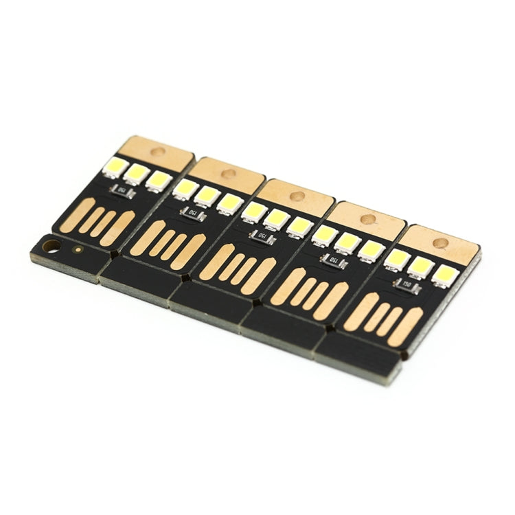 Black USB LED keychain light board with multiple printed circuits and white LED clusters