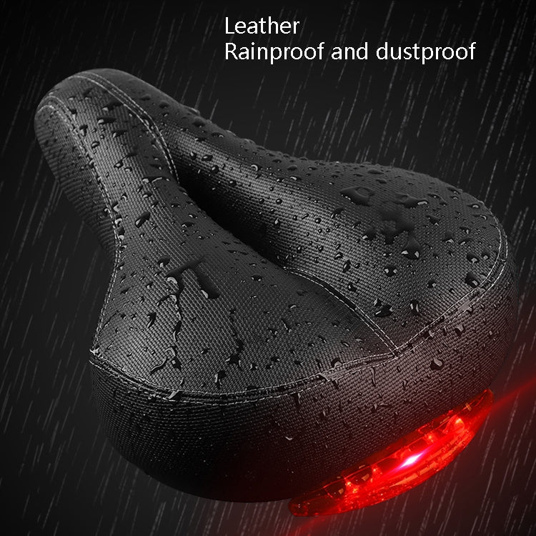 Black bicycle saddle with water-bead texture and rear red taillight