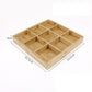 Light bamboo nine-compartment grid platter, divided into nine square sections for serving.