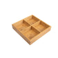 Light bamboo three-compartment grid platter with dividers for separate food sections.