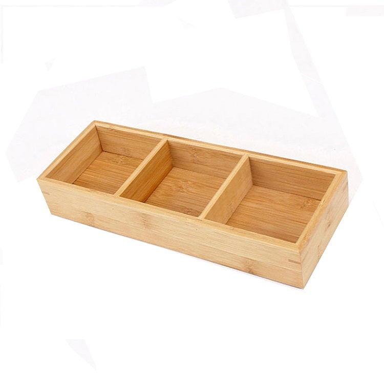Light bamboo three-compartment serving platter with three divided rectangular sections.