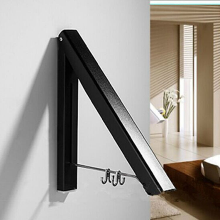 Black wall-mounted drying rack with extended arms and metal hook bar