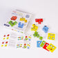 Wooden face-change cube puzzle tiles with character faces and instruction pages on table