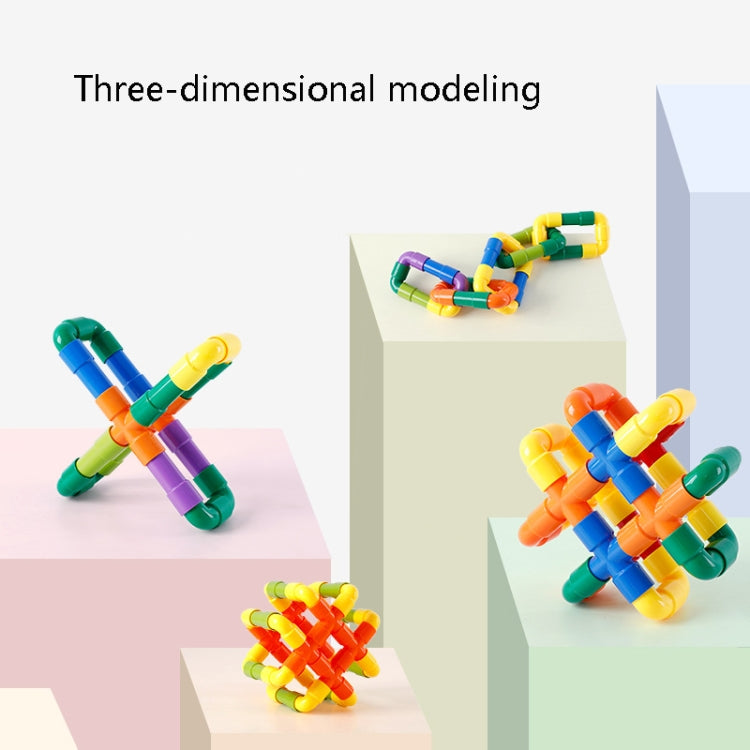 Plastic pipe building blocks featuring three assembled models with colorful pipes and wheels
