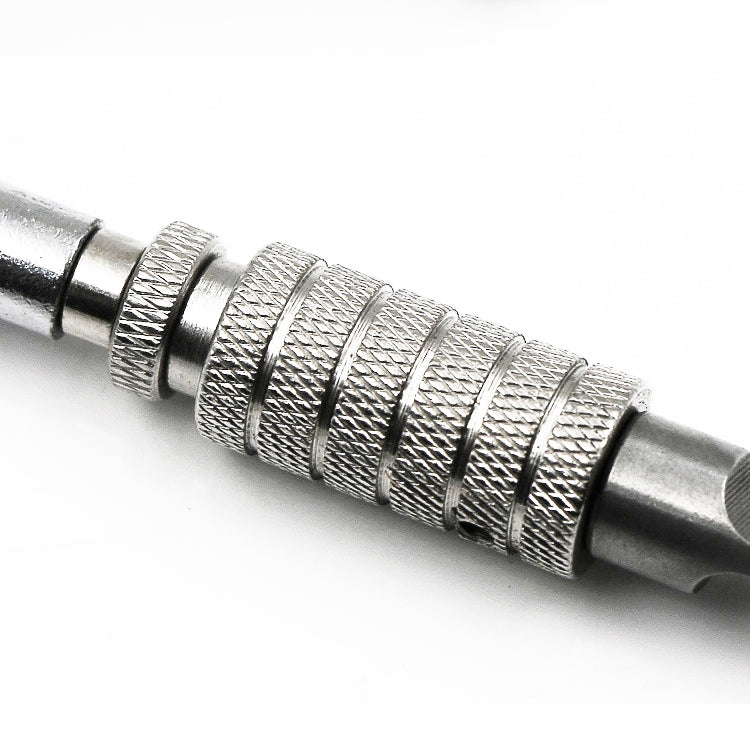 Textured knurled grip section of a rotary leather carving knife with metal handle
