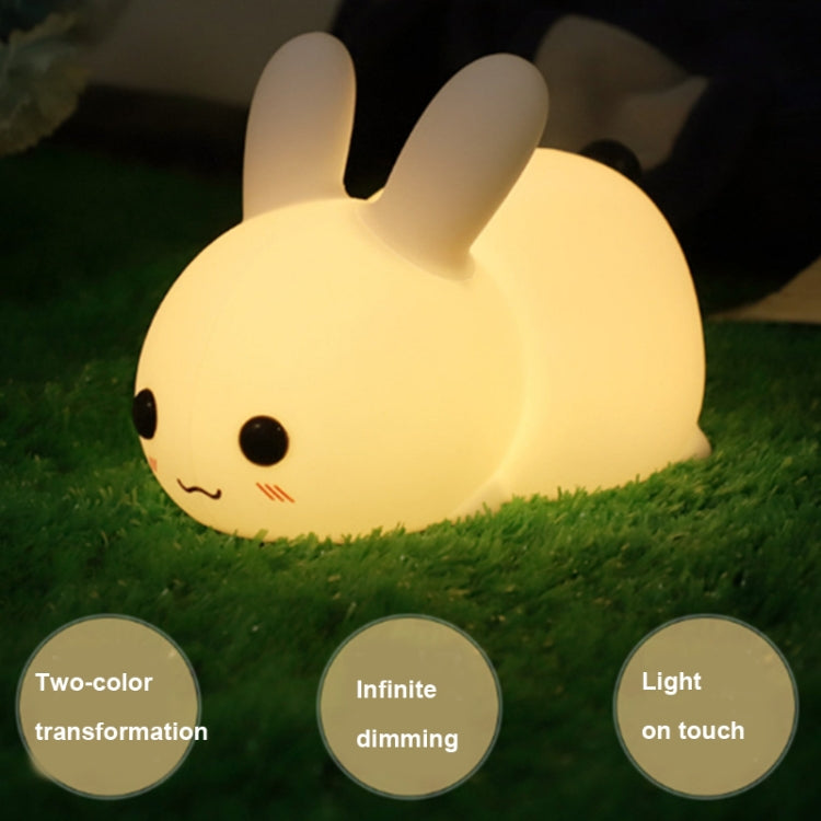 Warm yellow rabbit LED night light with cute face, touch lighting