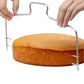 Adjustable wire cake cutter slicing a round cake; wire frame with leveling feet