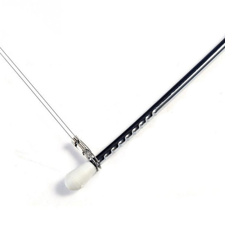 Close-up of stainless wire cake cutter end with white guide and adjustable fittings