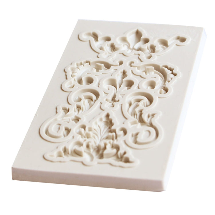 Rectangular floral scroll silicone mold with raised bouquet-like border medallion