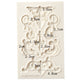 Floral scroll border silicone mold with printed dimension guide on the silicone