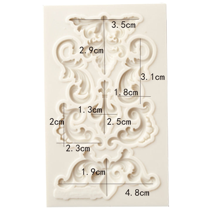 Floral scroll border silicone mold with printed dimension guide on the silicone