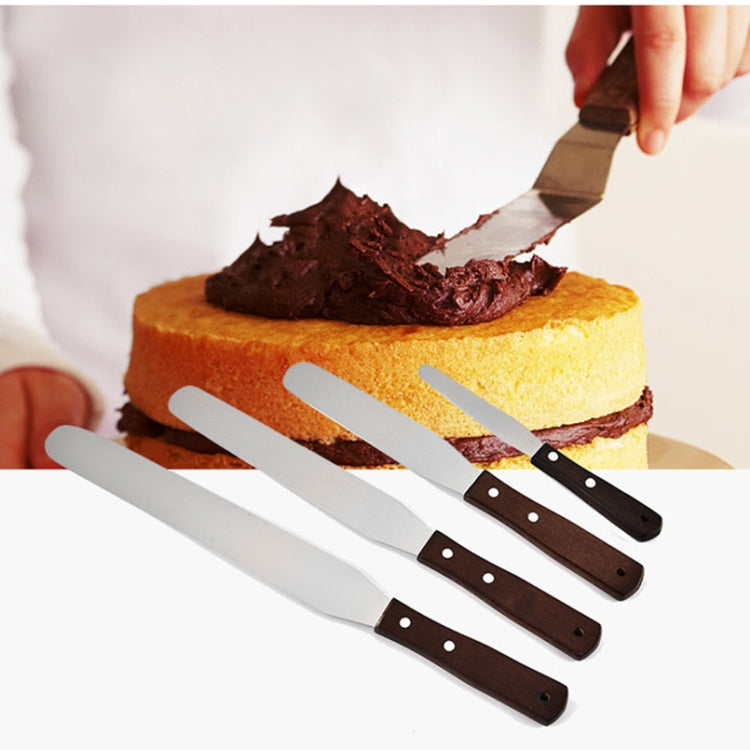 Set of 4 wooden-handled stainless steel icing knives spatulas with white blades