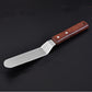 Stainless steel curved cake spatula with dark wood handle and two rivet dots