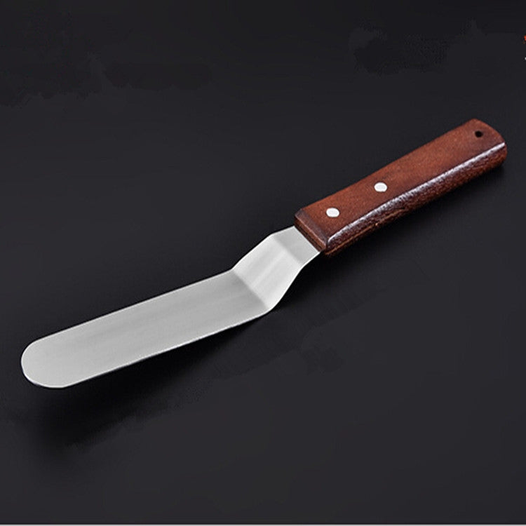 Stainless steel curved cake spatula with dark wood handle and two rivet dots