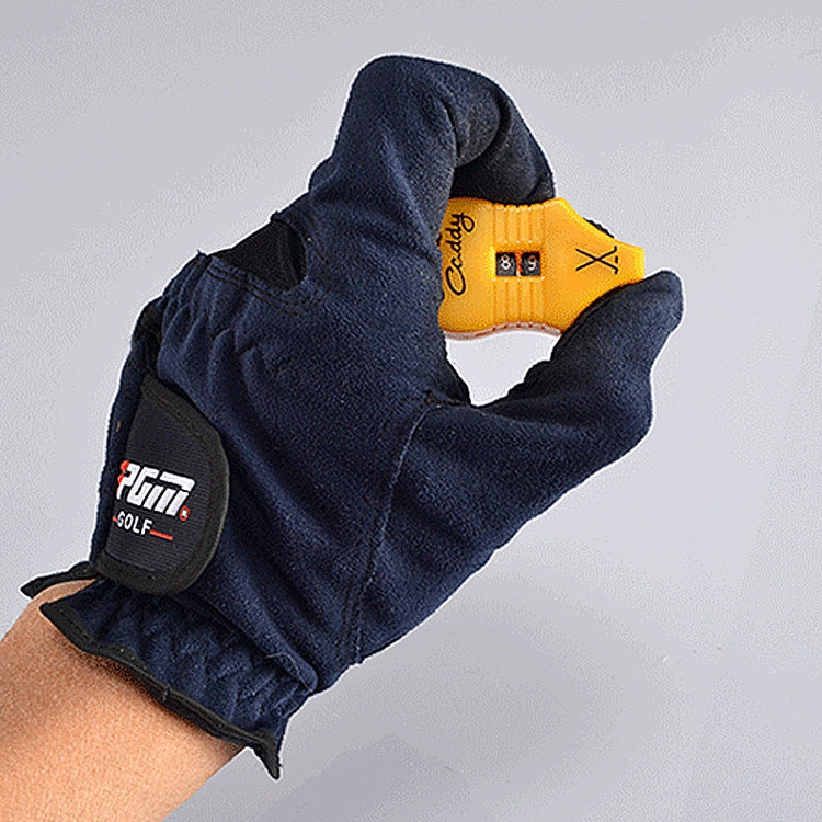 PGM gourd-shaped golf score counter held in navy glove hand, orange body