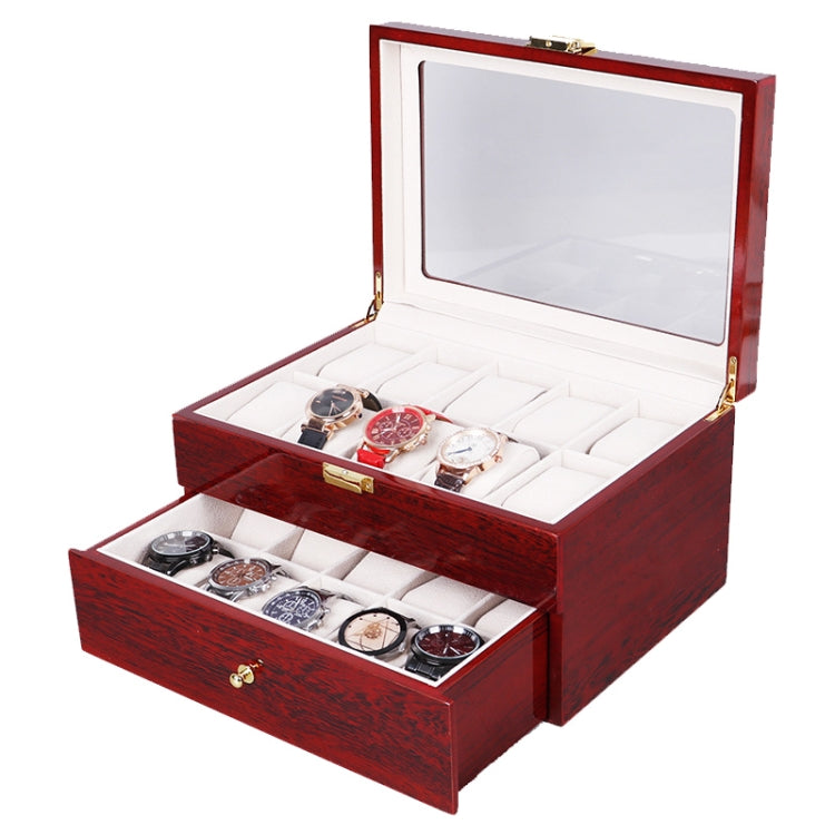 Red wooden watch and jewelry storage box open with clear lid and separate drawer