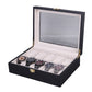 Black wooden watch storage box with clear lid and padded multi-watch compartments