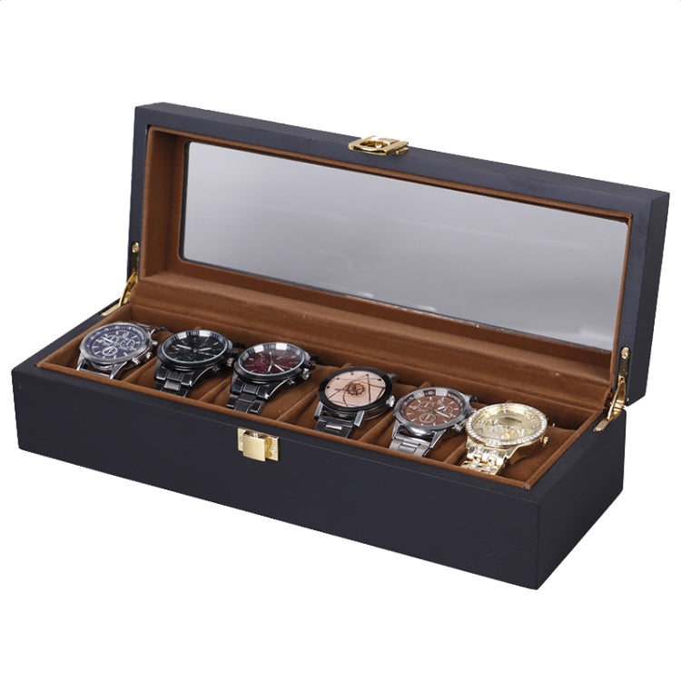 Brown-lined black wooden watch display box with clear lid and watch compartments